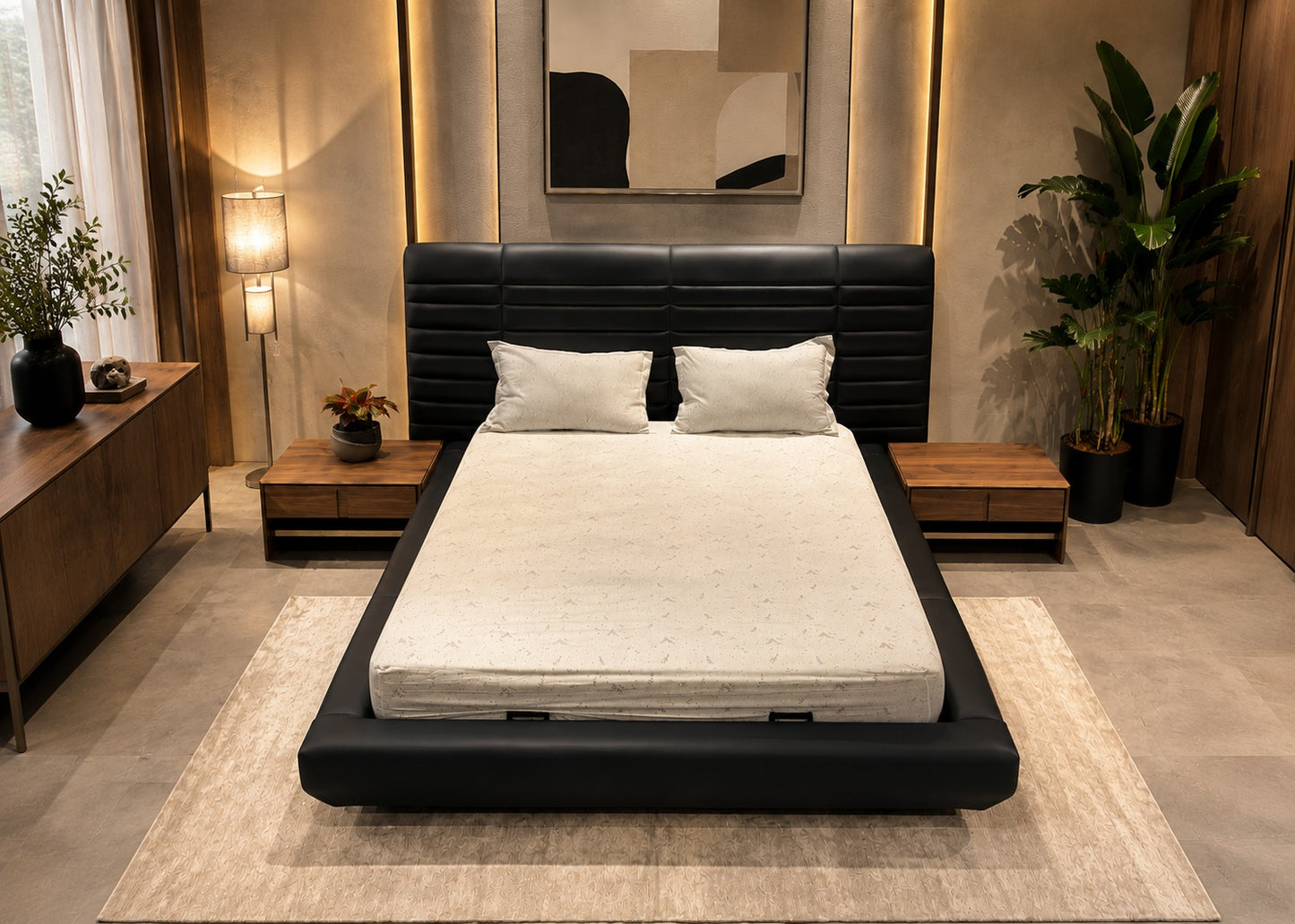 Modern bedroom with a black bed frame and white mattress.