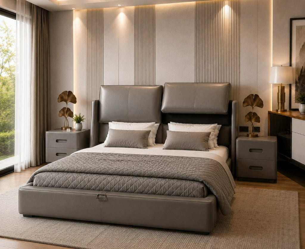 A modern bedroom featuring a large gray upholstered bed with a high segmented headboard, matching gray nightstands, and warm ambient lighting against a slatted accent wall.