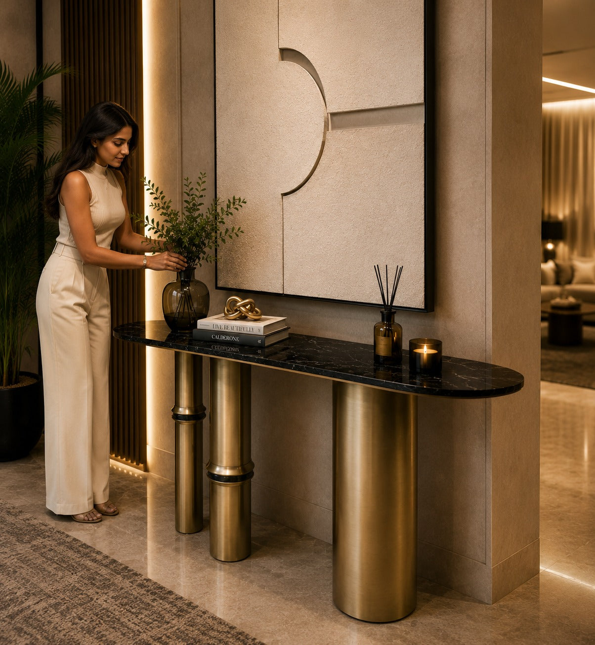 Woman arranging decor on a stylish console table in a modern interior setting.