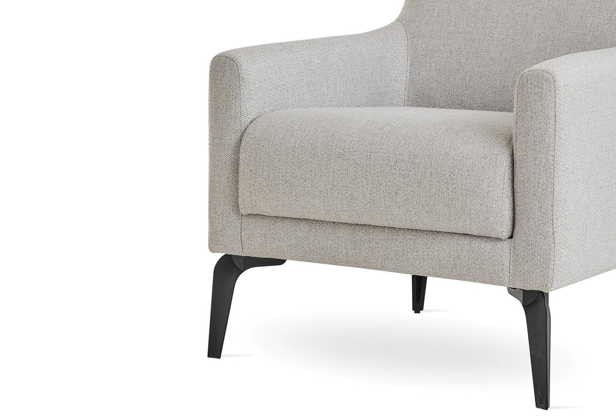 Coordinating Cante armchair upholstery and leg detail