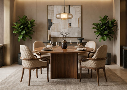 Dining room with wooden table and chairs, abstract painting on the wall, and potted plants.