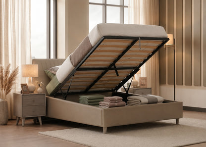 Beige upholstered bed with storage compartment in a bedroom setting