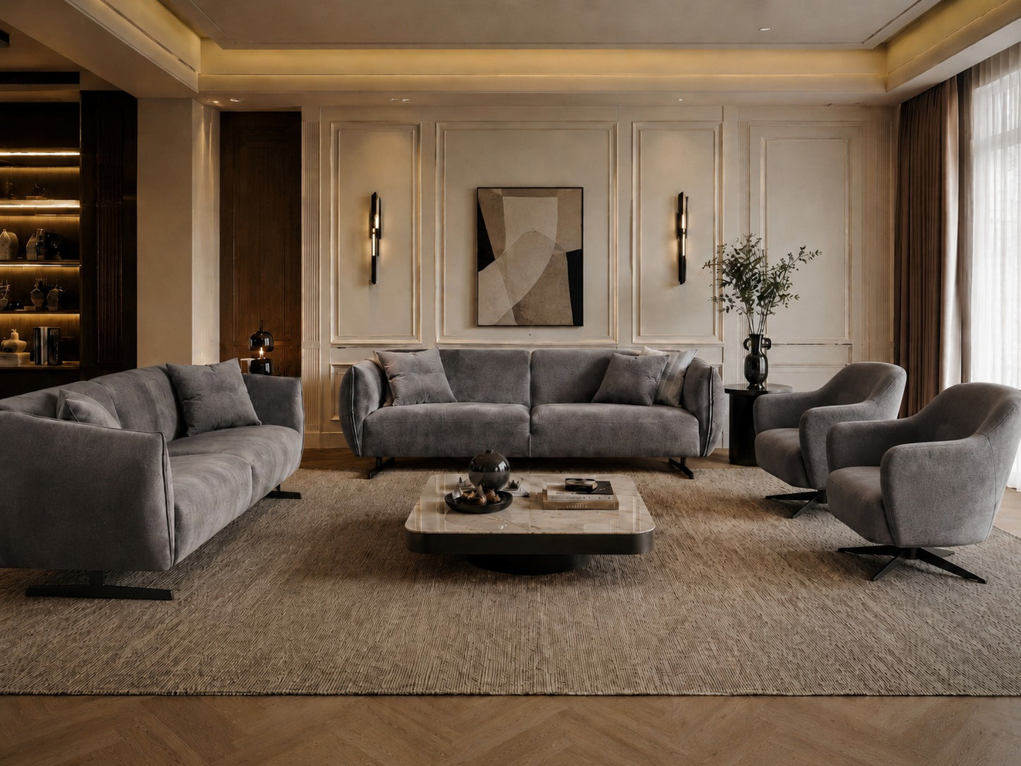 Modern living room with gray sofa, coffee table, and decorative elements.