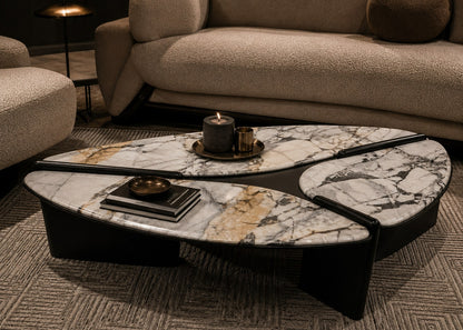 Marble-patterned coffee table in a living room setting with a beige sofa.