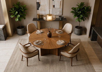 Dining room with a round wooden table and four chairs, set for a meal.