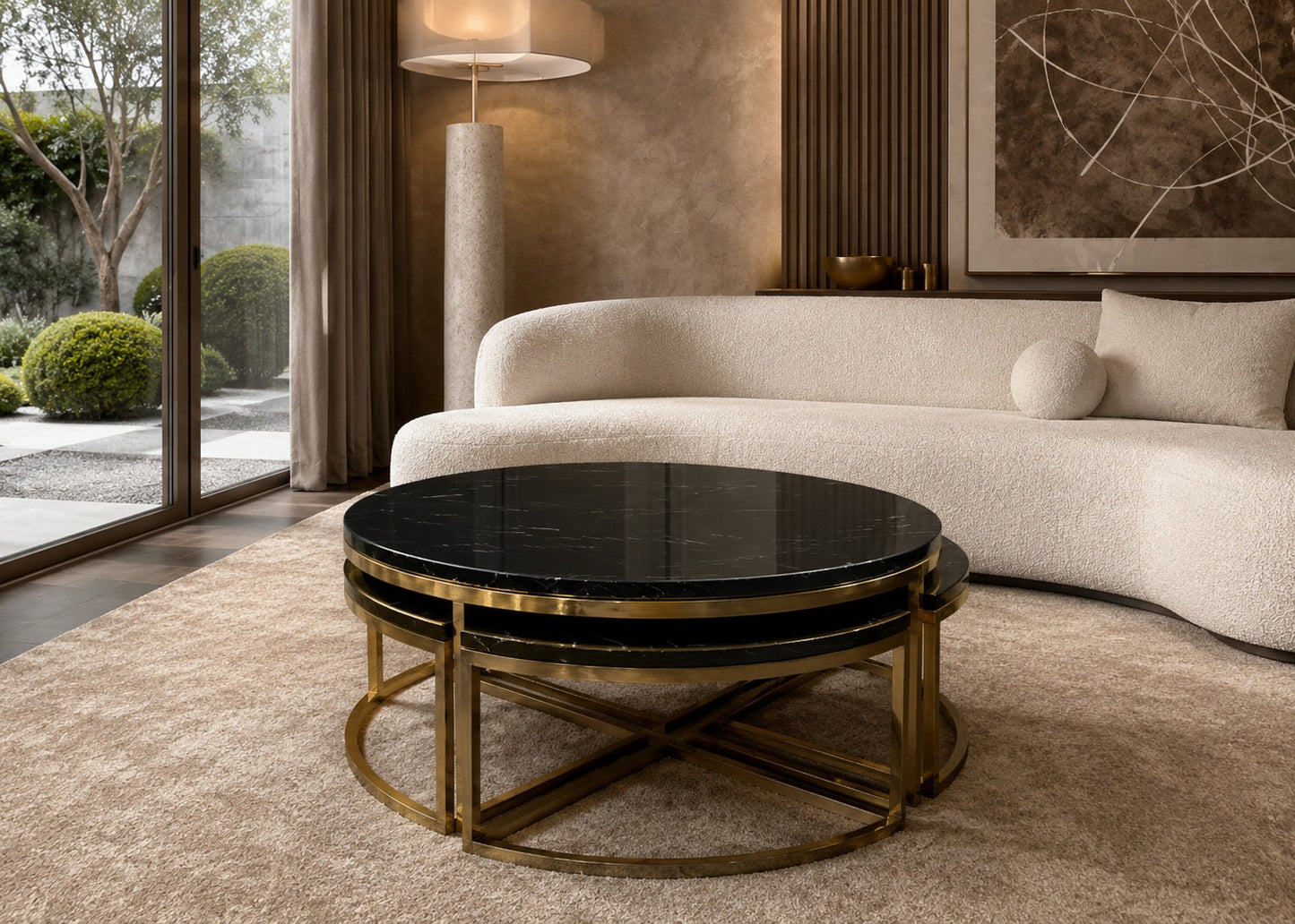 Modern living room with a round coffee table and beige sofa.