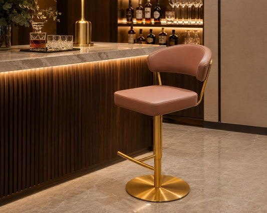 Pink bar stool with gold legs in a bar setting
