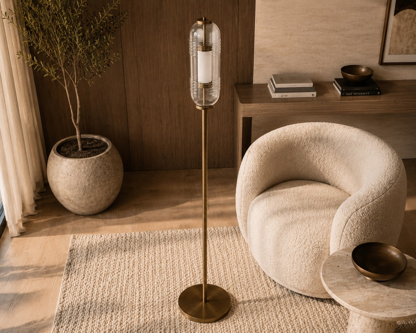 Modern interior with a textured armchair, standing lamp, and decorative items.