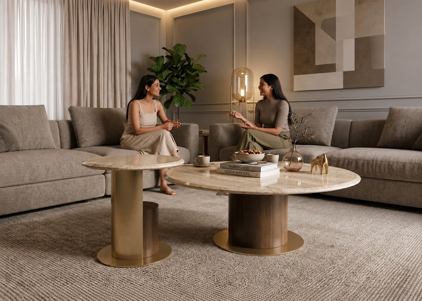 Two women sitting on a couch in a modern living room with a coffee table and decorative items.
