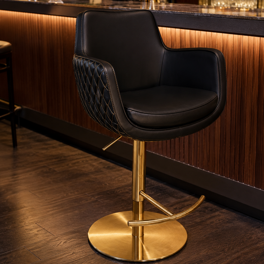 Black bar stool with gold base in a bar setting