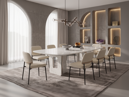 Modern dining room with a marble table and beige chairs in a stylish interior.