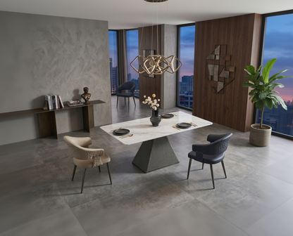 Modern dining room with a white marble table and stylish chairs, featuring a cityscape view.