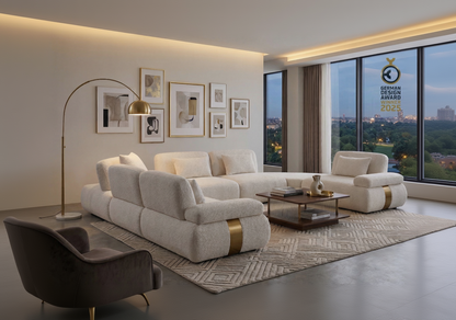 Modern living room with a beige sectional sofa, coffee table, and decorative elements.