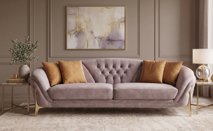 Gray sofa with gold pillows in a stylish living room setting.