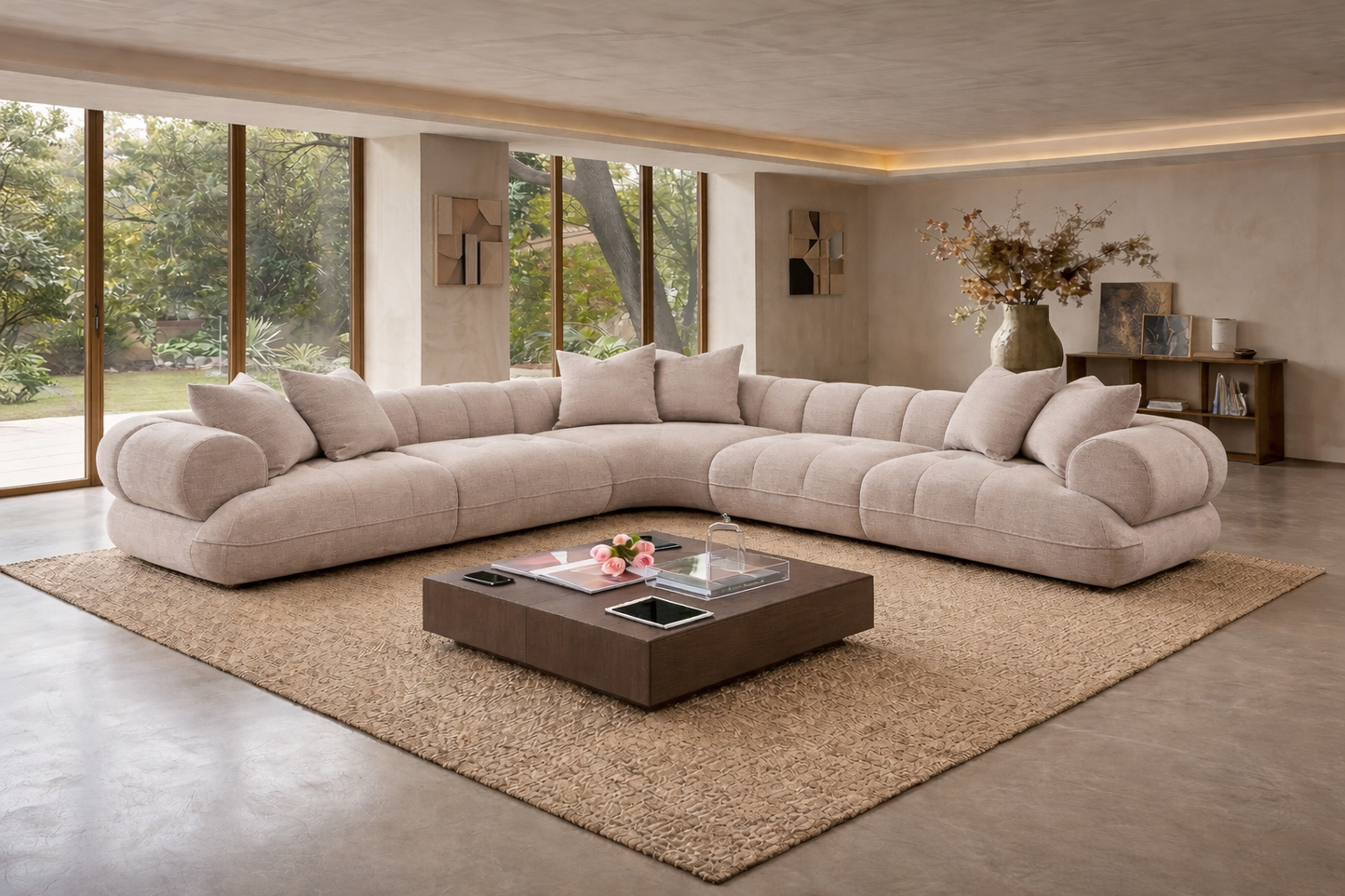 Beige sectional sofa in a modern living room with a coffee table and decorative elements.