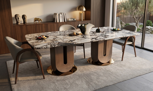 Modern dining table with marble top and wooden base in a stylish room.
