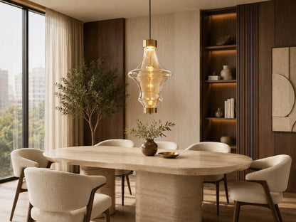 Modern dining room with a large pendant light, round table, and chairs.