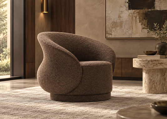 Ajda Armchair in cappuccino brown upholstery with sculptural curved silhouette and swivel base in a warm contemporary living room