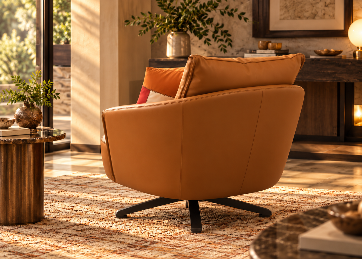 Aveline cognac leather lounge armchair rear view with curved upholstery and four-spoke base
