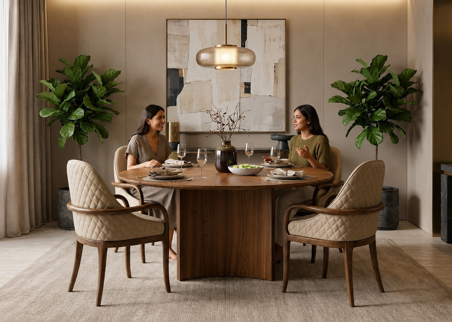 Two women sitting at a wooden dining table in a modern living room with plants and artwork.