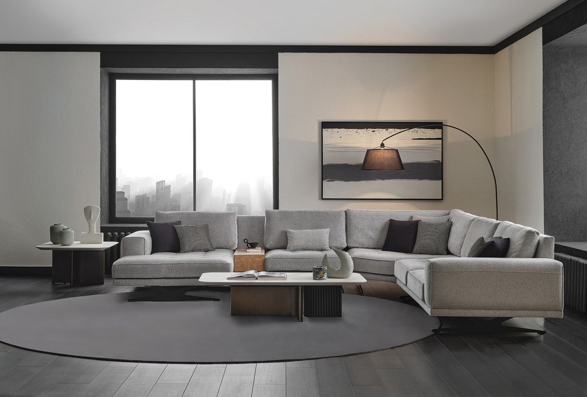 Bold modular corner sofa in grey chenille by Enza Home - front lifestyle view