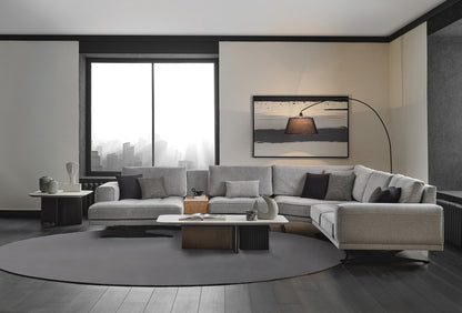 Bold modular corner sofa in grey chenille by Enza Home - front lifestyle view