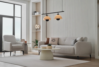 Cante cream 3-seater sofa-bed with coordinating armchair in a living room