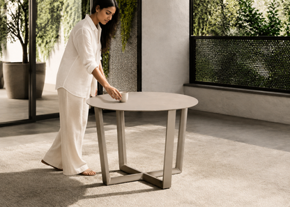 Cattelan table in Milan Metal Pergola with Indian model – lifestyle view
