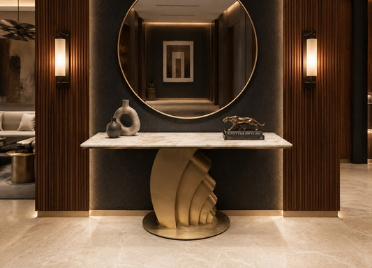 Luxurious interior with a marble console table and decorative items in a modern hallway.