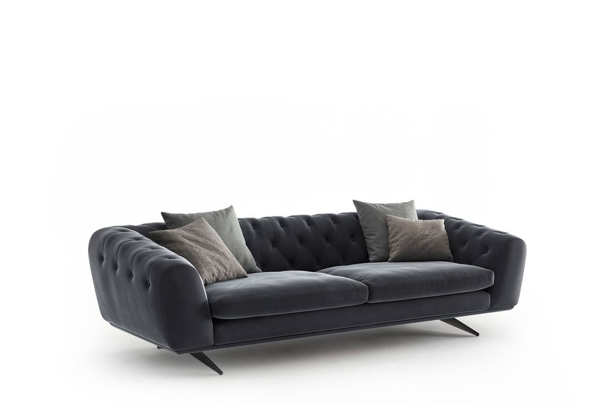 Manchester Soft Sofa in charcoal grey with deep button tufting and slim black metal legs