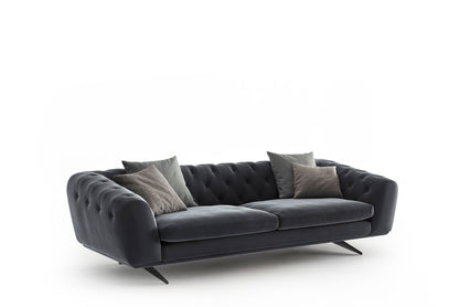 Manchester Soft Sofa in charcoal grey with deep button tufting and slim black metal legs