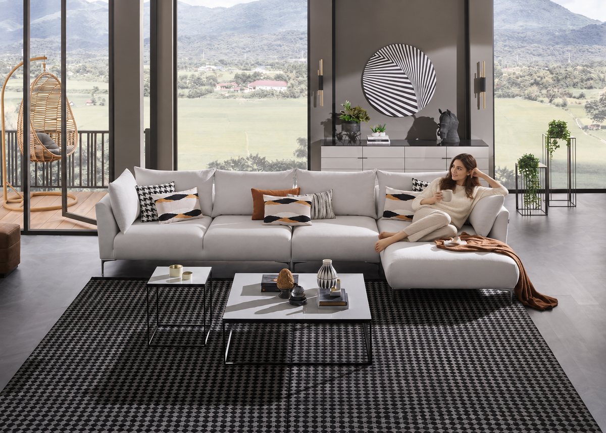Mayfair Corner by Enza Home with woman relaxing on chaise