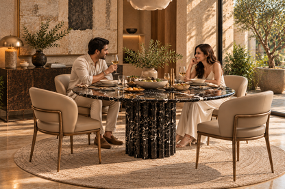 Noir Velluto marble dining table in a contemporary dining room with two guests at a meal