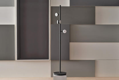 Oblo Floor Lamp by Enza Home, black metal floor lamp with three black and white plexiglass light heads