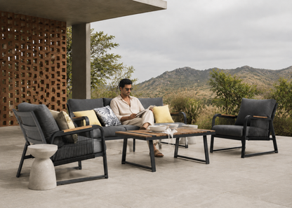 Rover Outdoor Sofa with an Indian model in the Chandigarh Modernist Patio