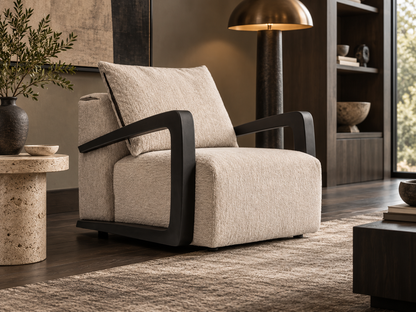Soho Armchair in a luxury modern living room with beige textured upholstery and black sculptural arms