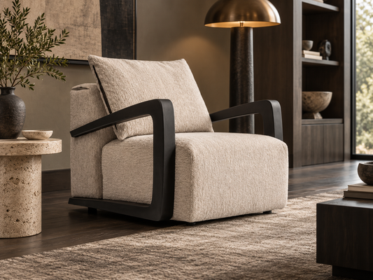 Soho Armchair in a luxury modern living room with beige textured upholstery and black sculptural arms