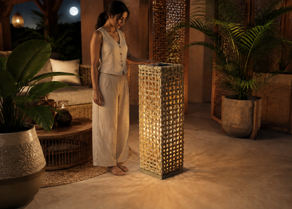 Solar Rattan Light in Moonlit Cane Pergola with Indian model – lifestyle view