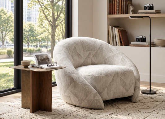 Solenne Armchair in a sunlit contemporary reading nook