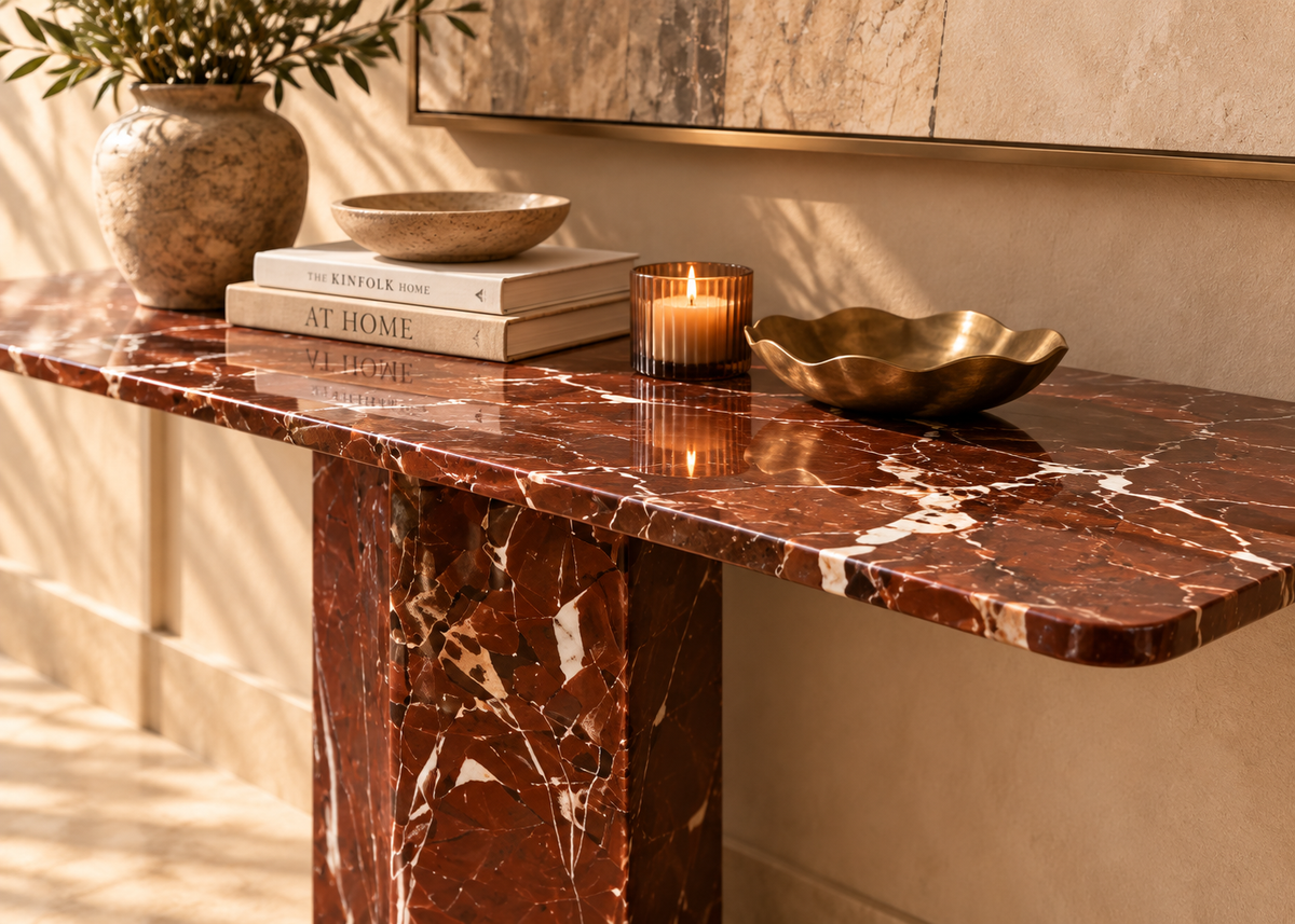 Solenne red burgundy marble console top close-up showing contrasting white marble veining and polished surface