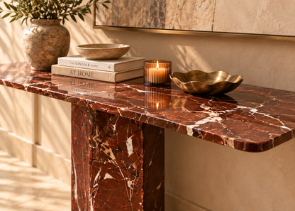 Solenne red burgundy marble console top close-up showing contrasting white marble veining and polished surface