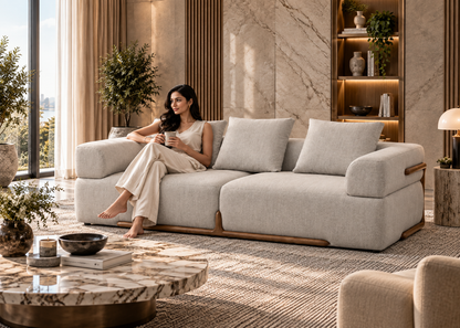 Solenne Sofa 3 seater in cream textured upholstery with warm wood trim in a luxury modern living room