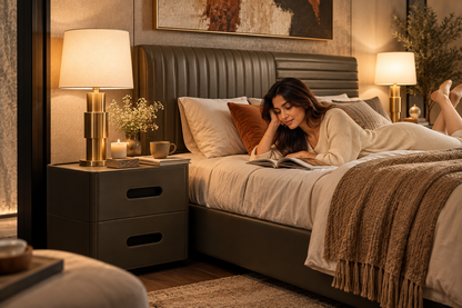 Avera Bed with matching two-drawer nightstand and brass bedside lamp in a warm bedroom