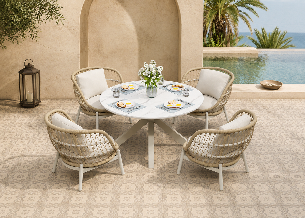 The Marbella Round Dining Set top front view in the Marbella Limewash Courtyard