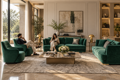Zen emerald green luxury sofa set with two guests in an elegant formal living room
